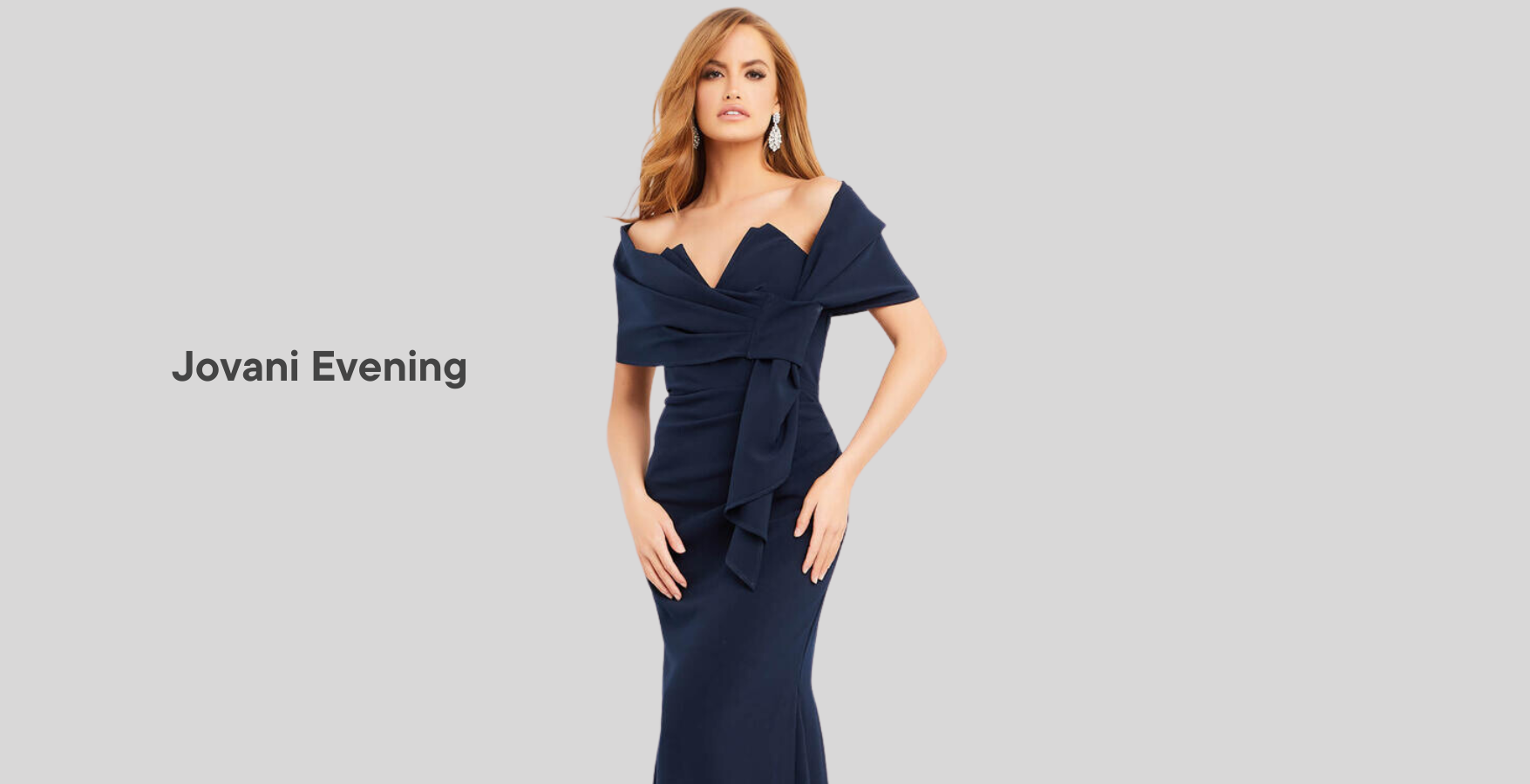 female wearing navy dress with pleats and text 'Jovani Evening' on the left