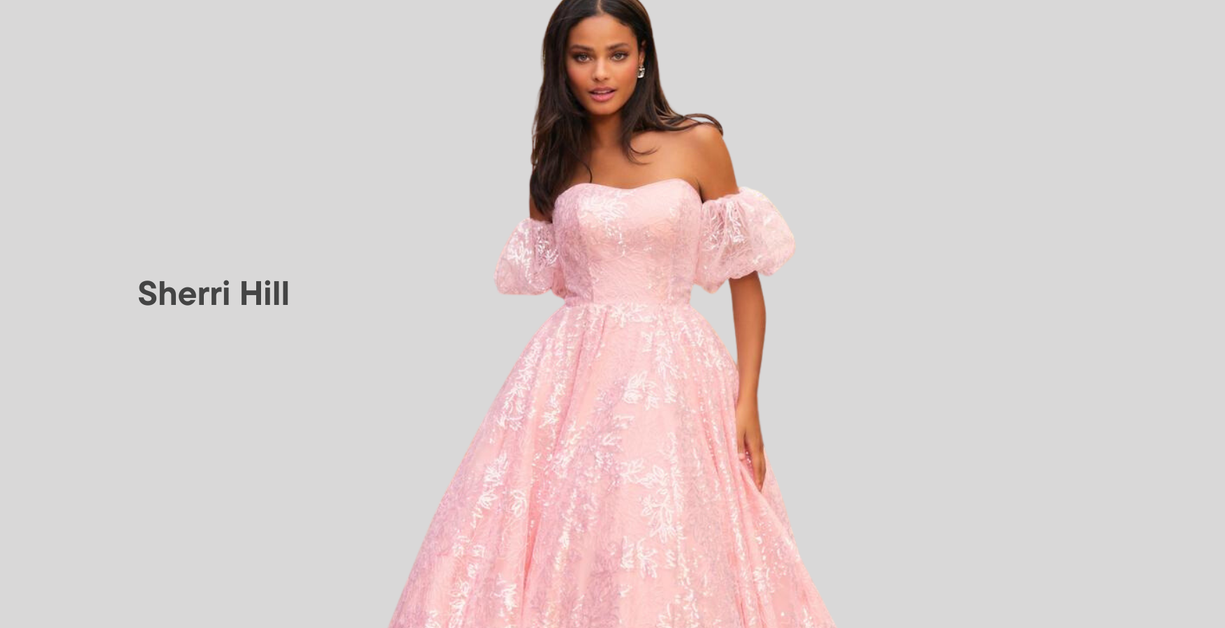 female wearing pink sparkly ball gown for prom with text 'sherri hill' on the left