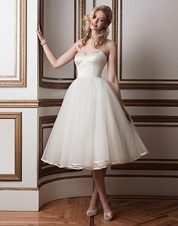 Regal satin and tulle tea length ball gown accented by a sweetheart neckline. 8800