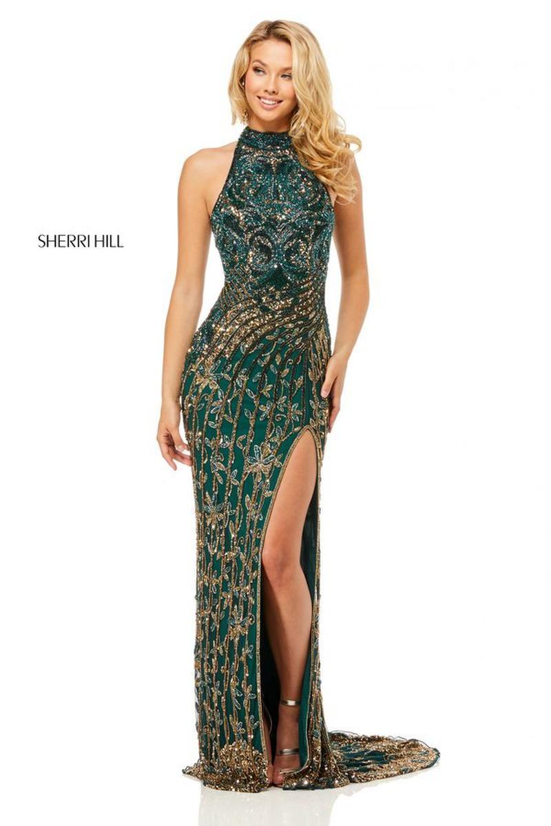 Fully beaded gown with high neck and open back.